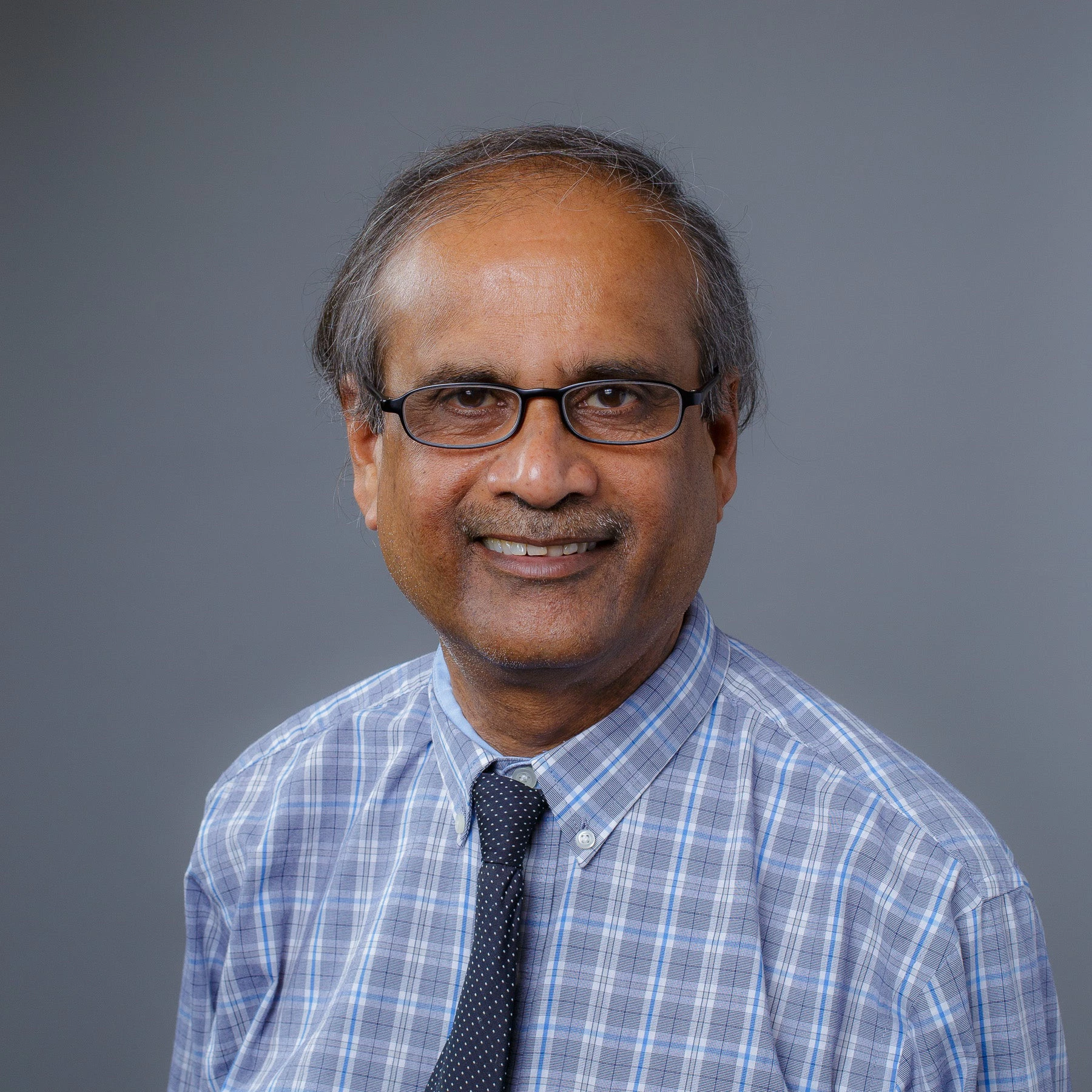 Prof. (Dr.) Partha Lahiri